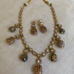 Kundan Polki Necklace Set with Pastel Pink & Grey Tumble Beads